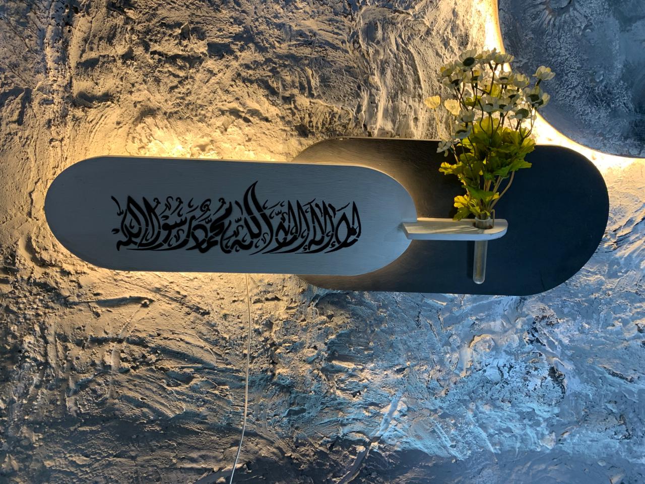 Serenity Calligraphy Sconce – Dual-Tone Backlit Wall Art with Integrated Vase