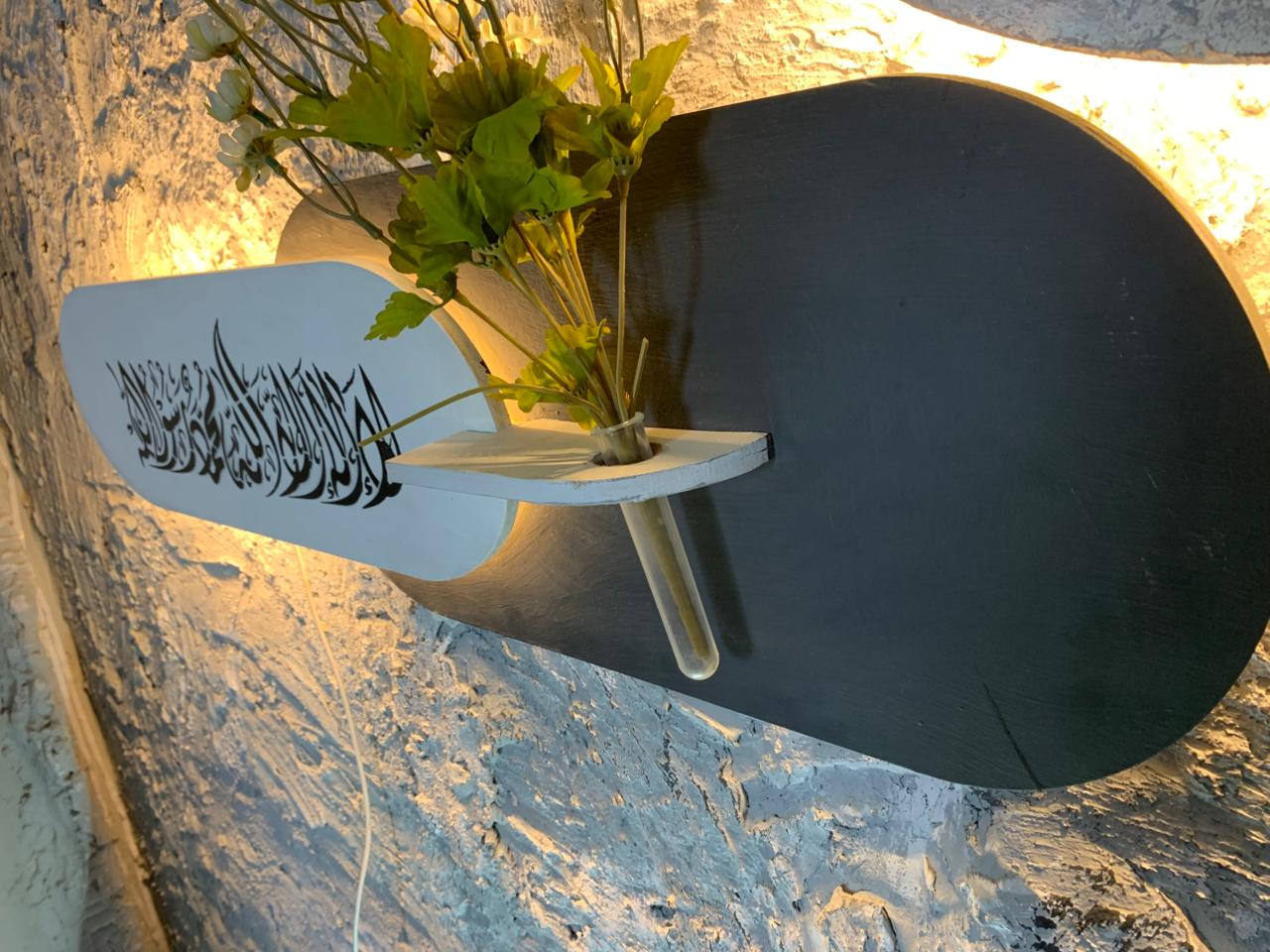 Serenity Calligraphy Sconce – Dual-Tone Backlit Wall Art with Integrated Vase